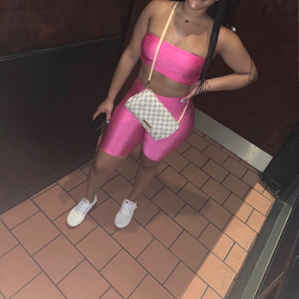 Hot pink two piece crop top and biker shorts set